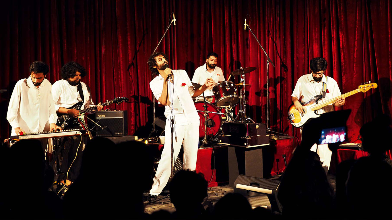 Peter Cat Recording Co. performing on stage