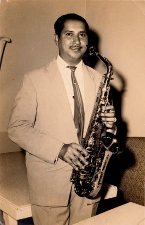 Joe Pereira Playing a trumpet
