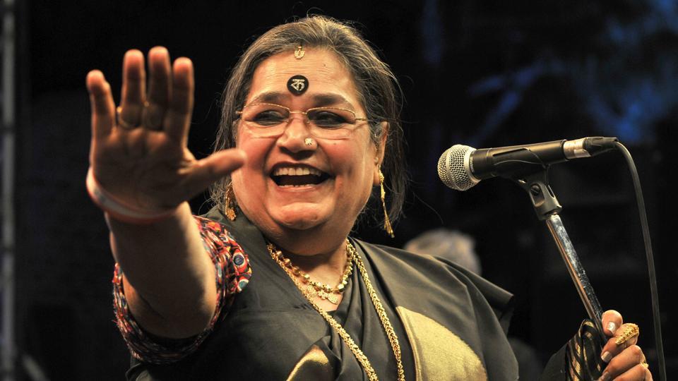 Usha Uthup on stage with microphone