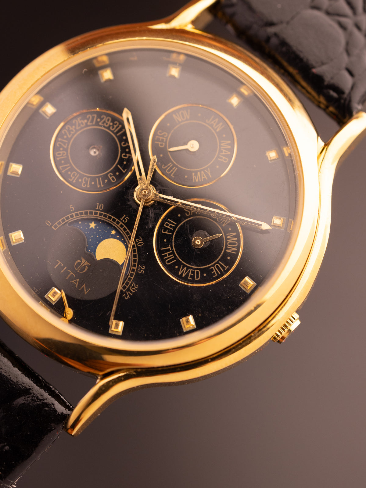 Titan Triple Calendar Moonphase (Ref. 257YAA) (36mm; Quartz)
