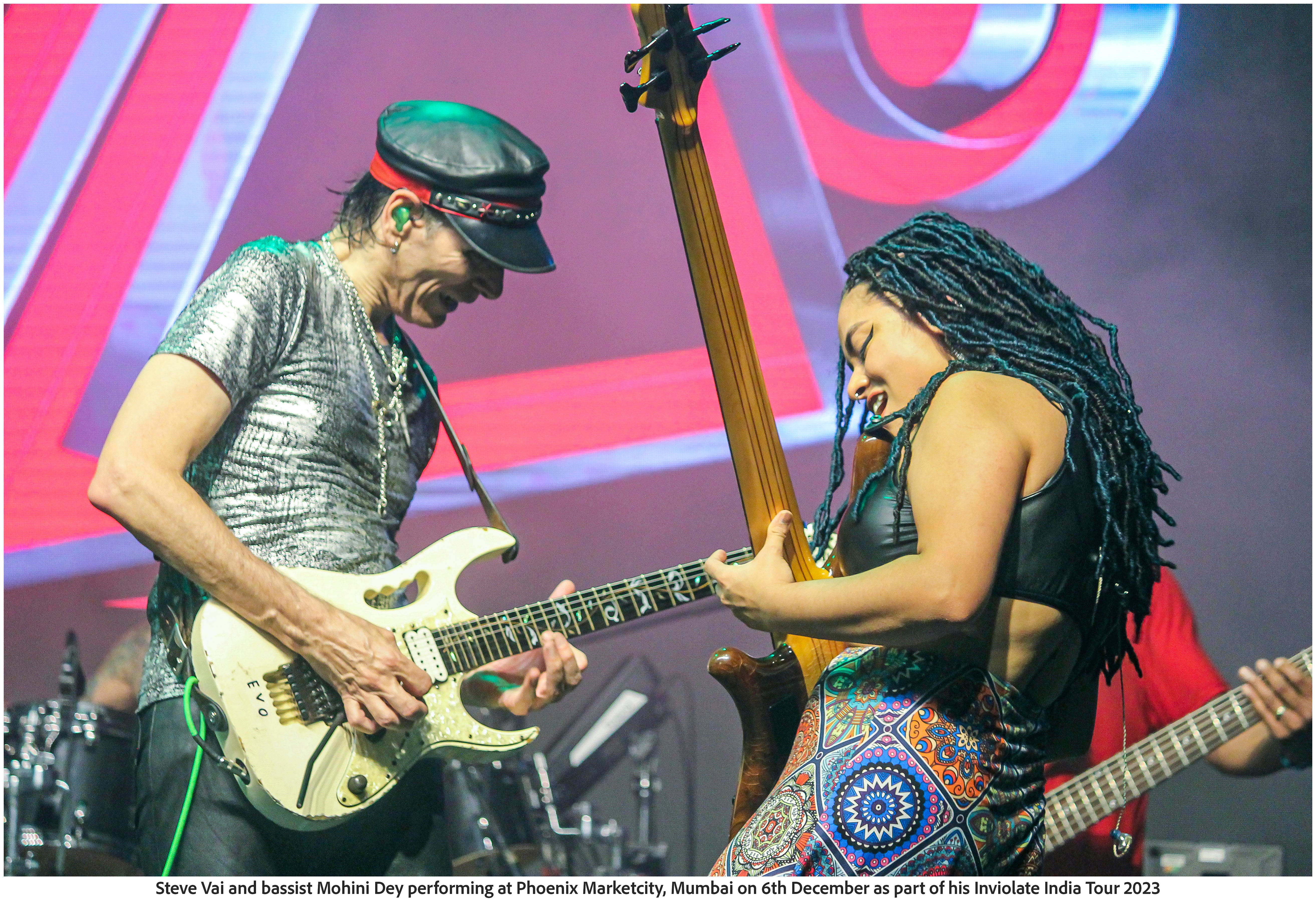 Steve Vai and bassist Mohini Dey performing at Phoenix Marketcity, Mumbai on 6th December as part of his Inviolate India Tour 2023 (Photo Frame)