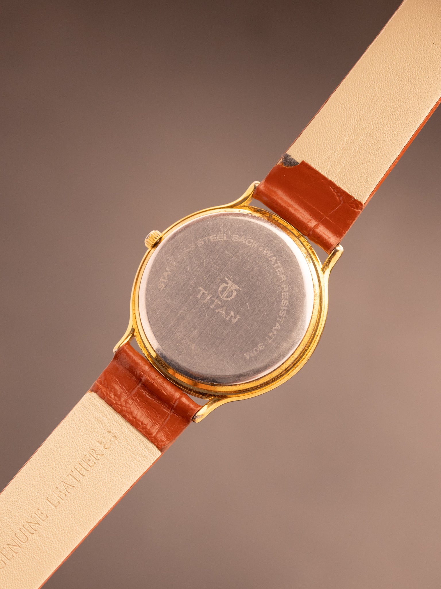 Titan Perpetual Calendar (Ref. 257YAD) (33mm; Quartz)