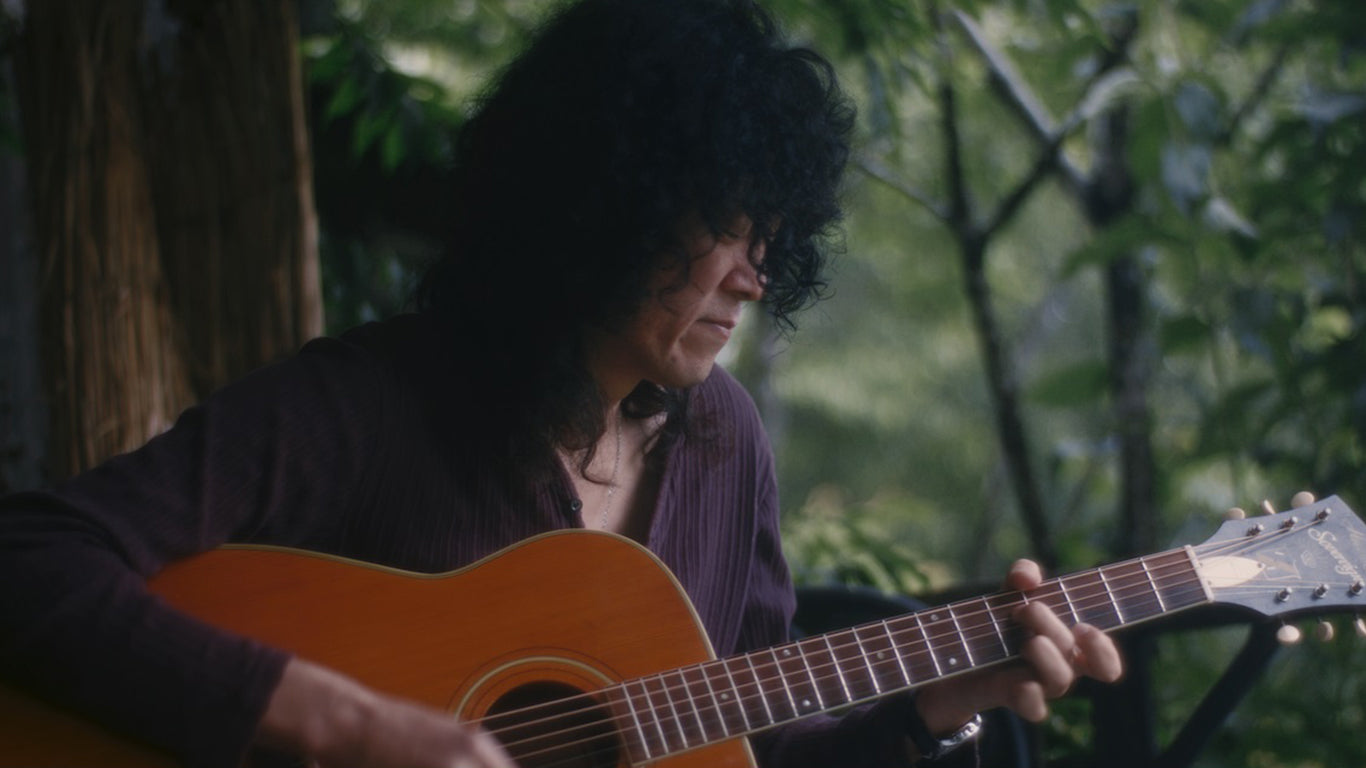 Akio Sakurai Jimmy Page Impersonator playing guitar by the woods