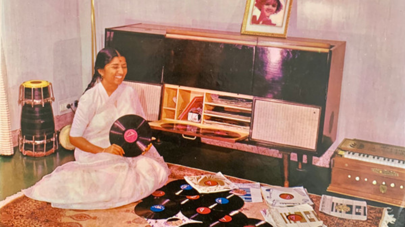 Indian woman holding records