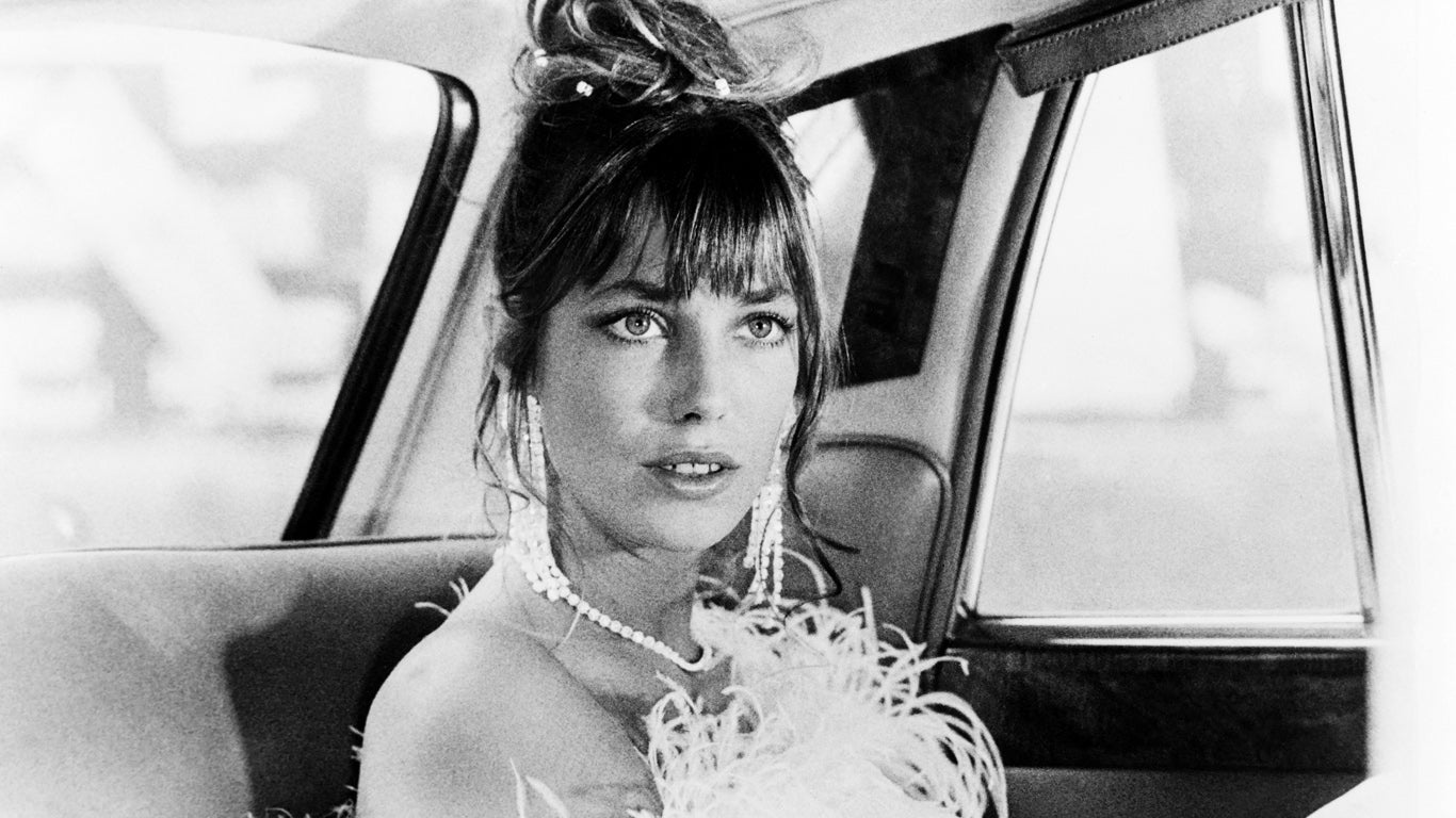 Jane Birkin sitting in car