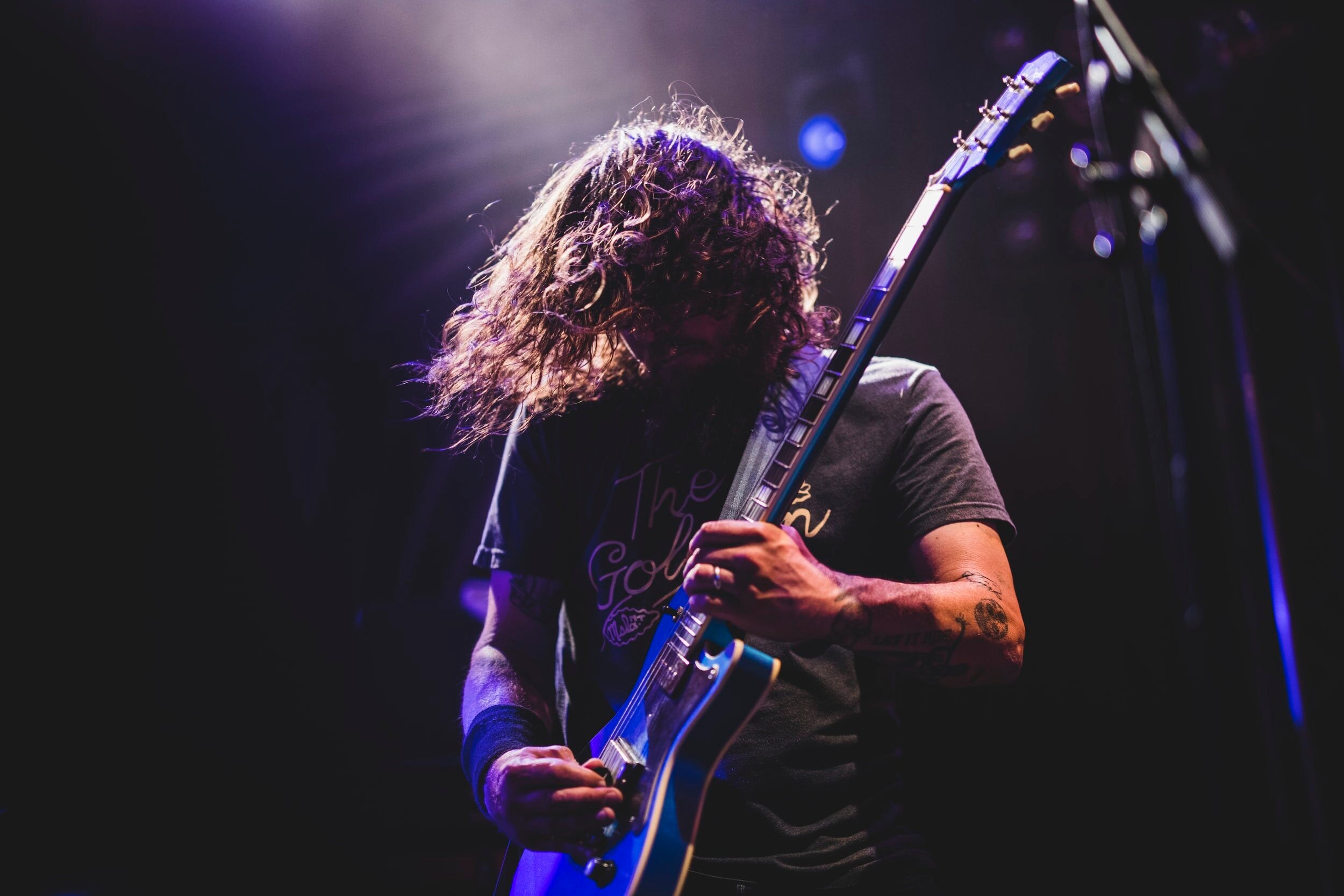 Rockstar playing guitar on stage