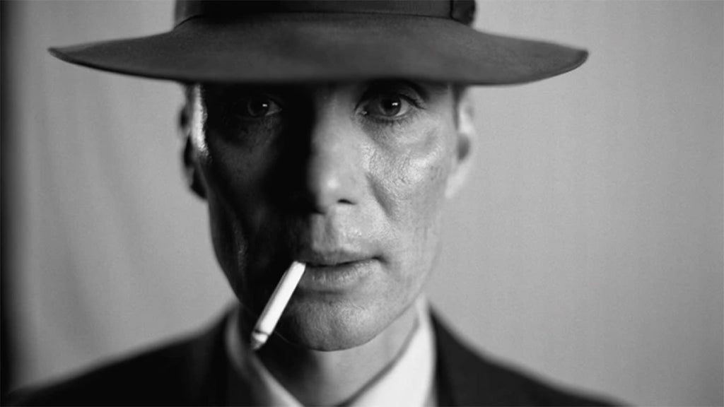 Cillian Murphy Smoking a cigarette with a hat on