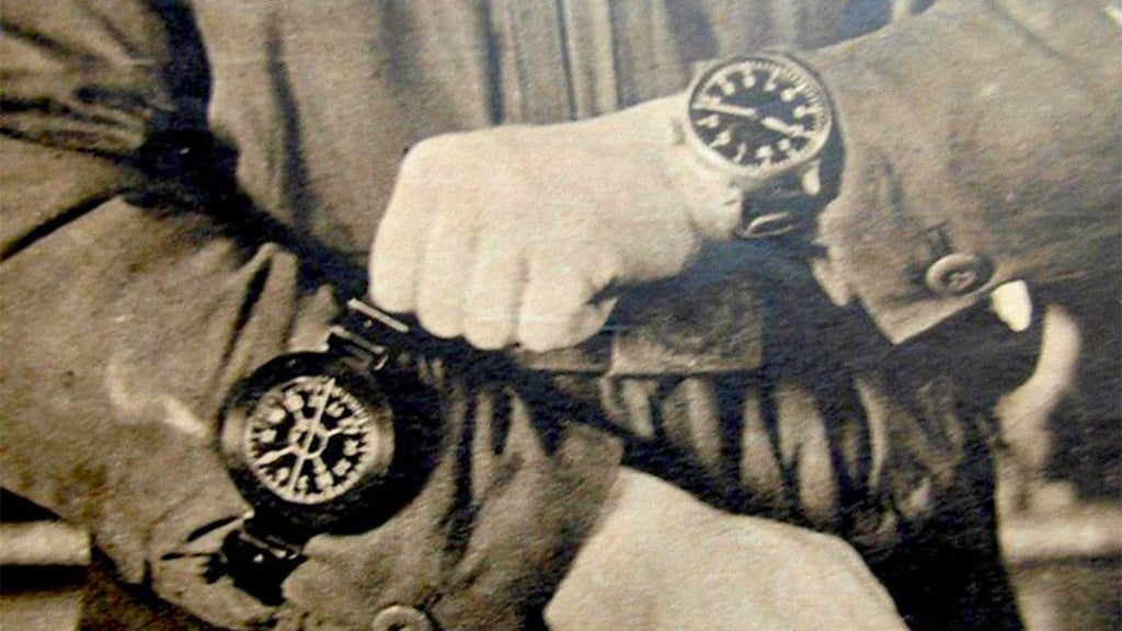 old photo of wristwatches on both hands