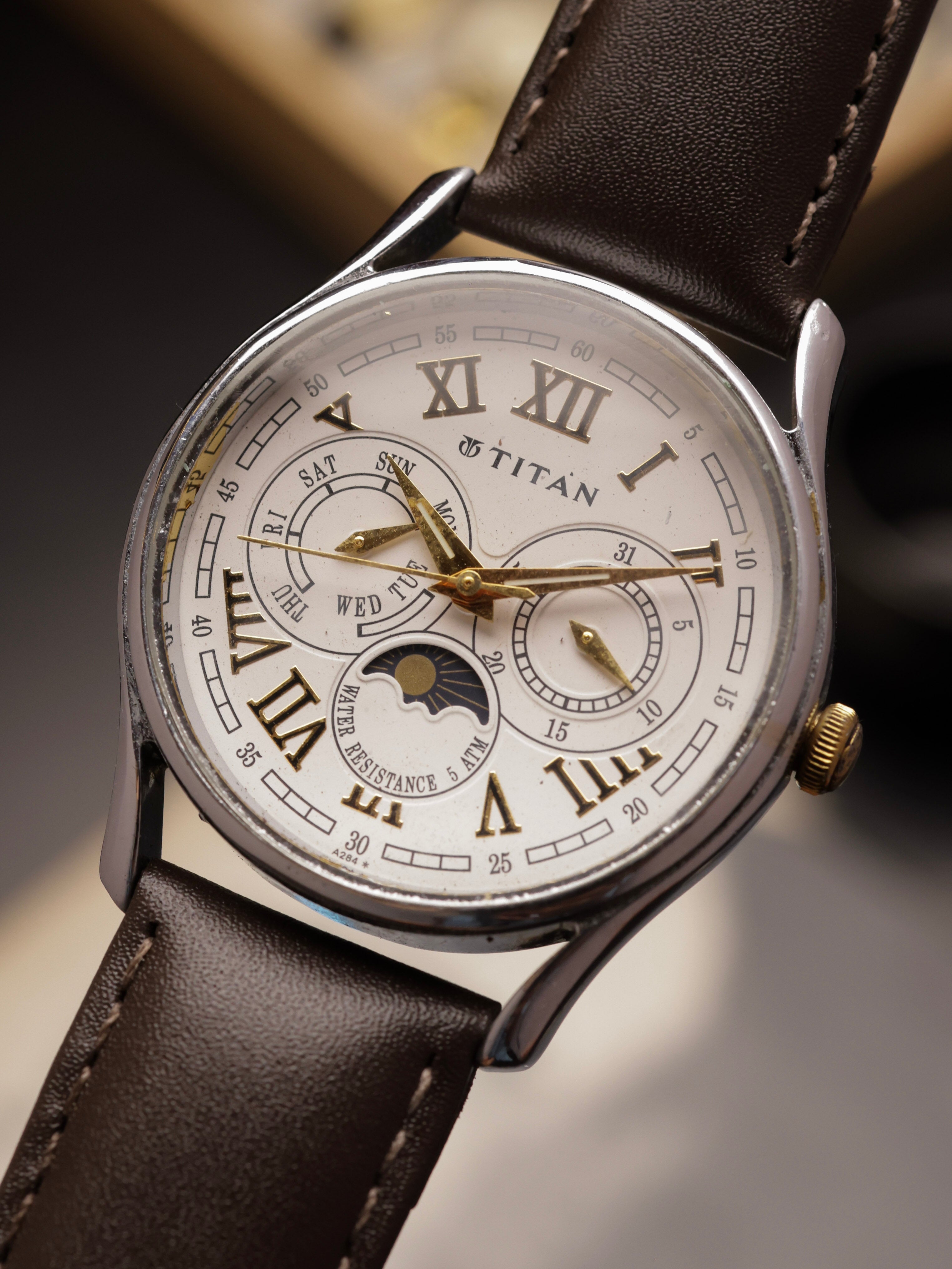 Titan Moonphase (Ref. 1487YAB) – White Dial