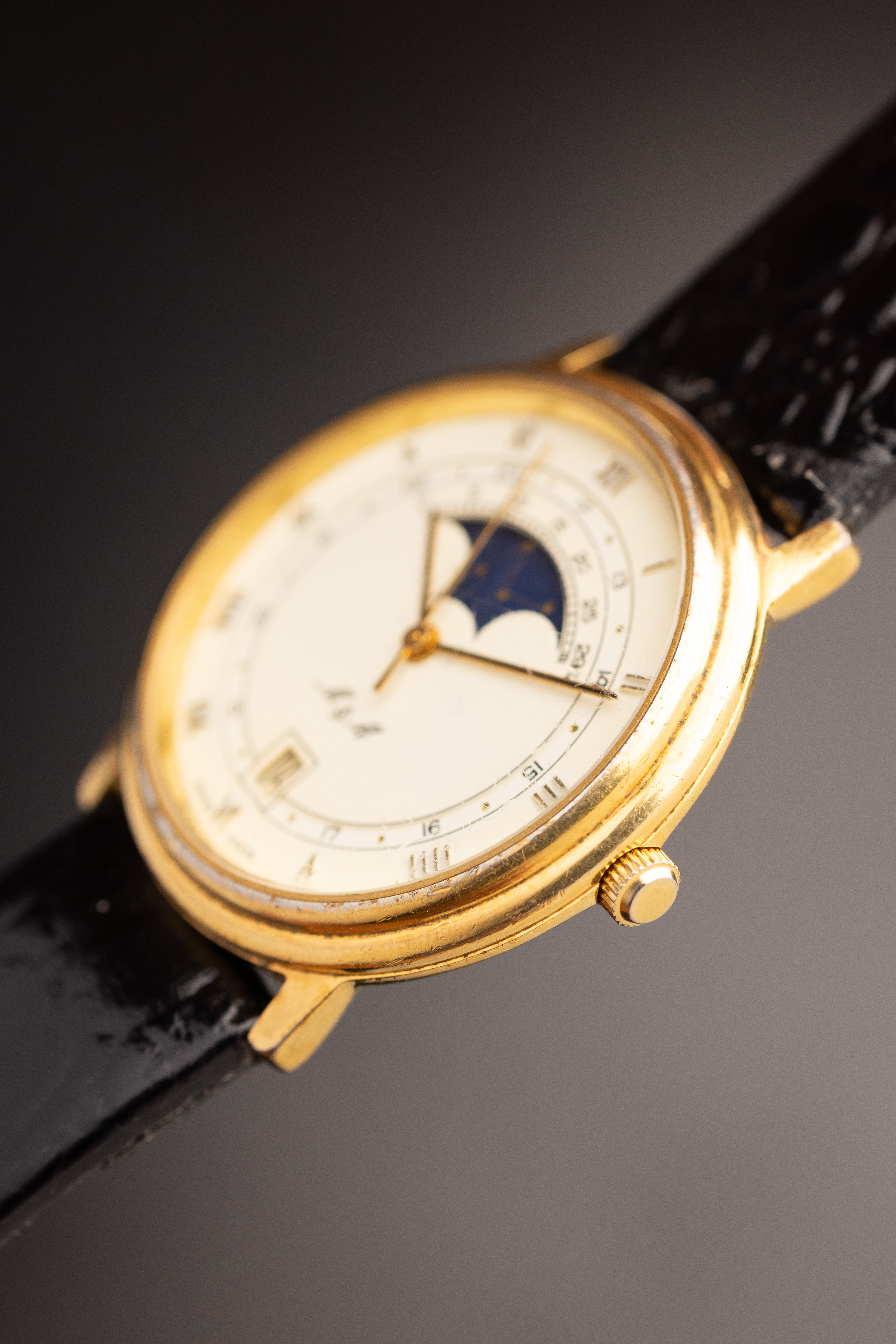 M&M Moonphase Dater (Ref. Unknown) (34mm; Quartz) (Very Rare)