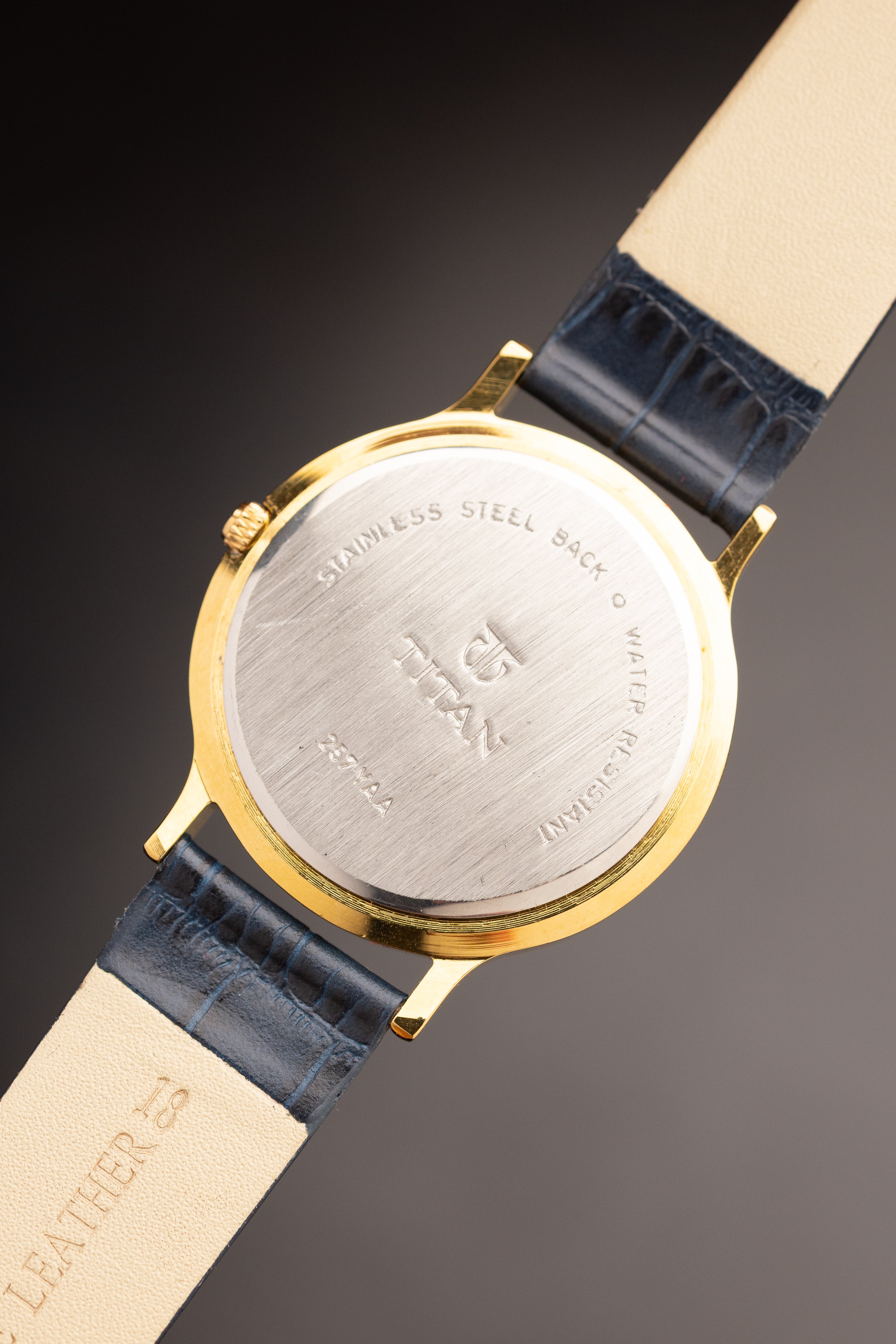 Titan Triple Calendar Moonphase (Ref. 257YAA) (36mm; Quartz)