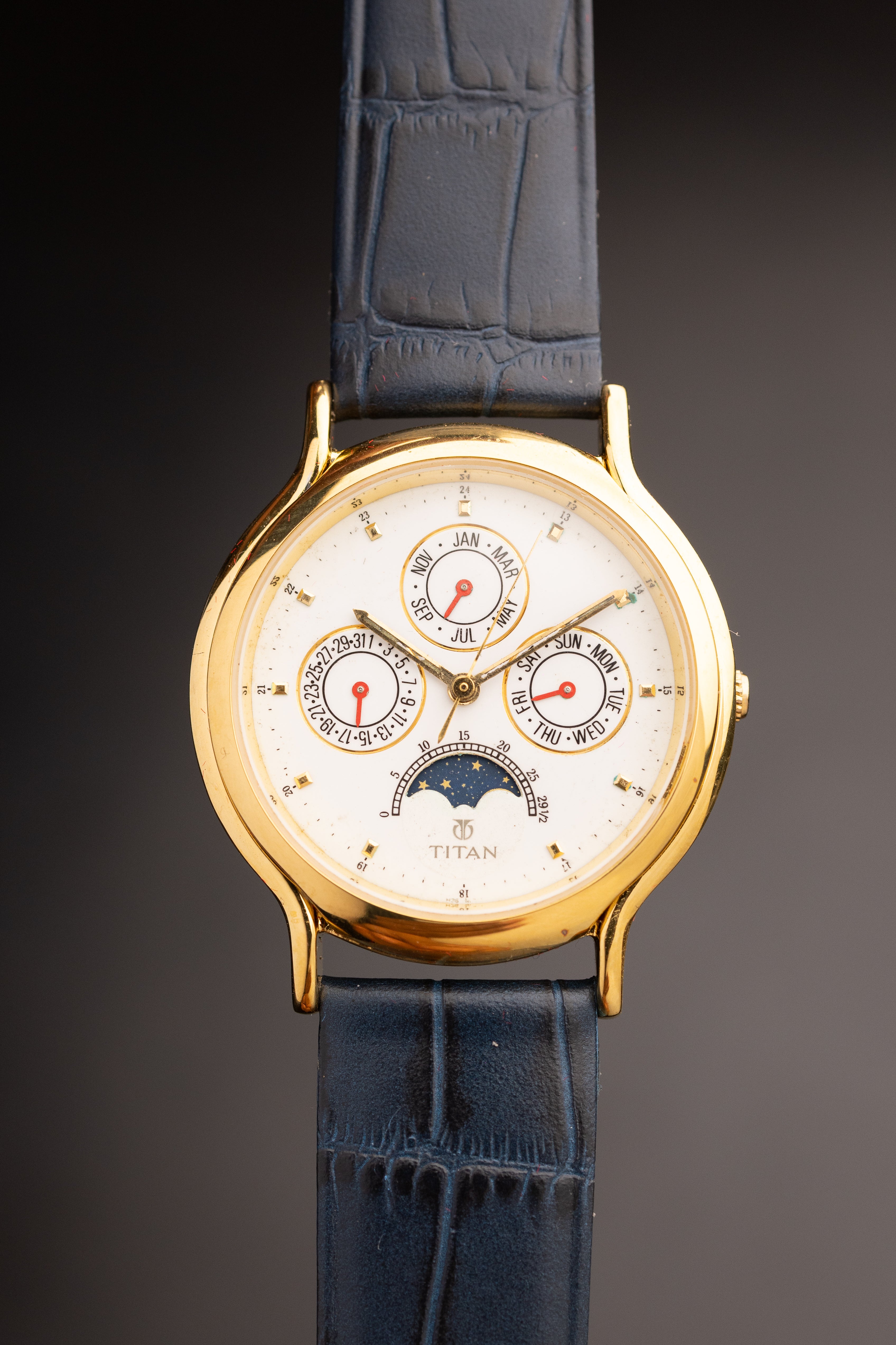 Titan Triple Calendar Moonphase (Ref. 257YAA) (36mm; Quartz)