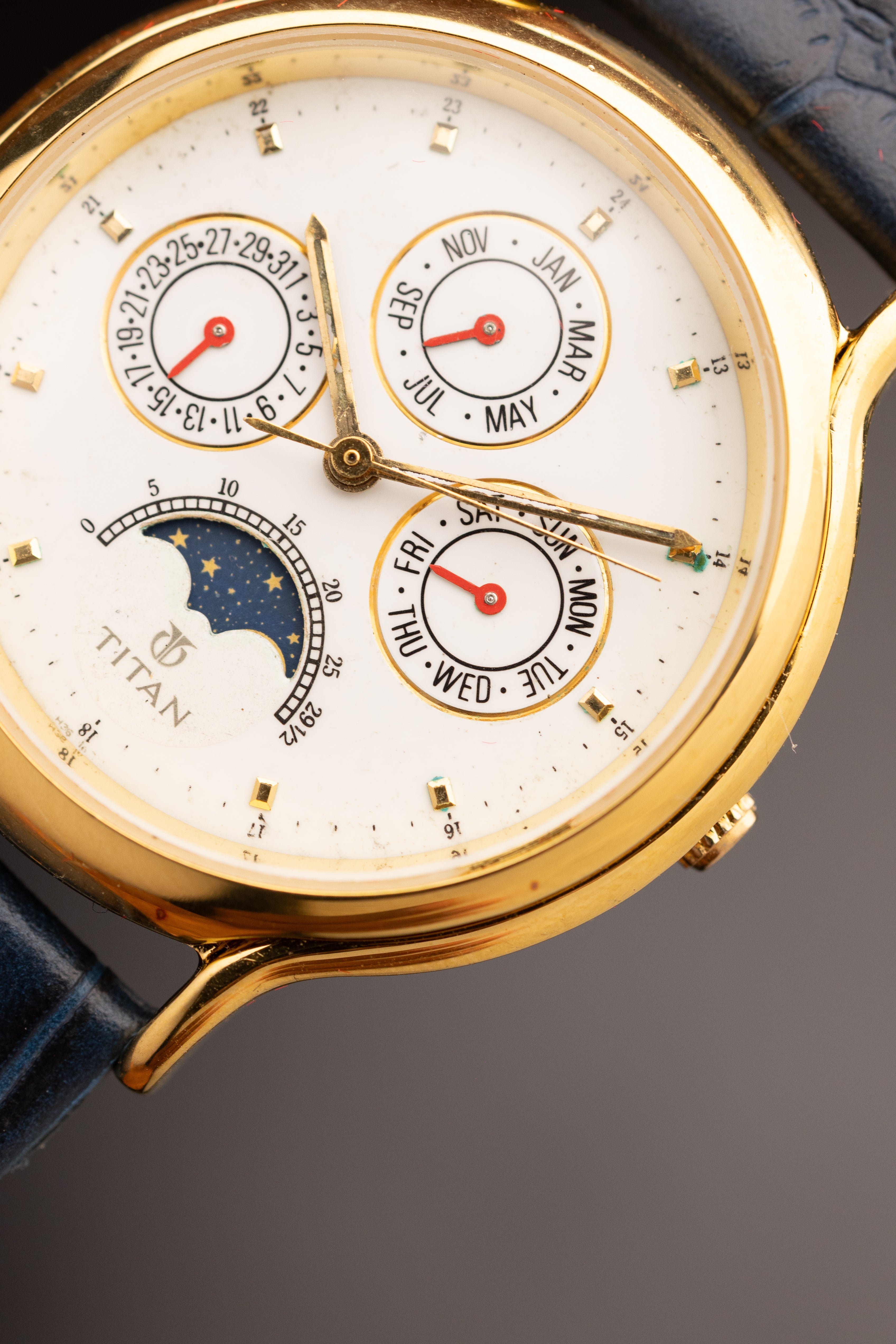 Titan Triple Calendar Moonphase (Ref. 257YAA) (36mm; Quartz)