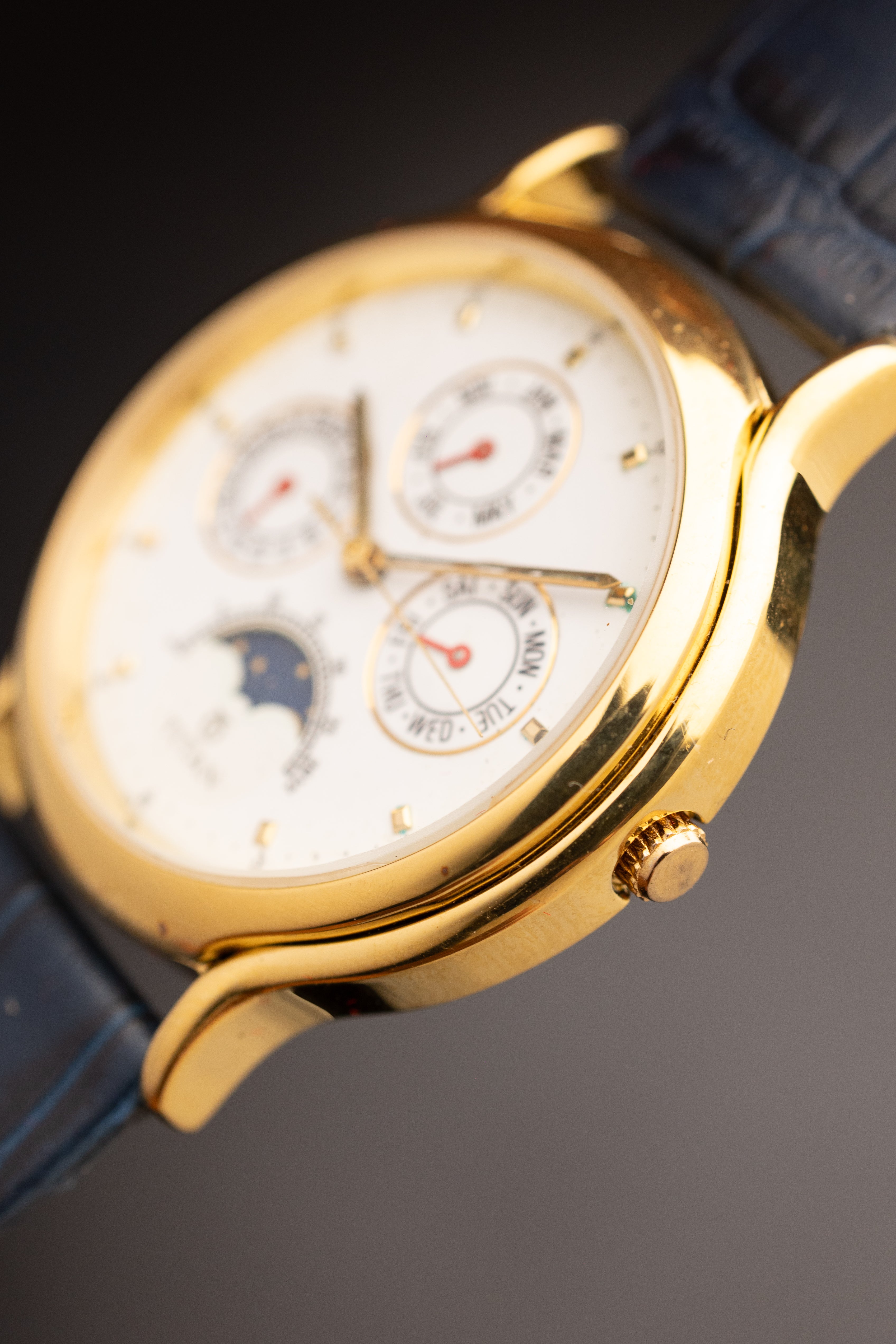 Titan Triple Calendar Moonphase (Ref. 257YAA) (36mm; Quartz)