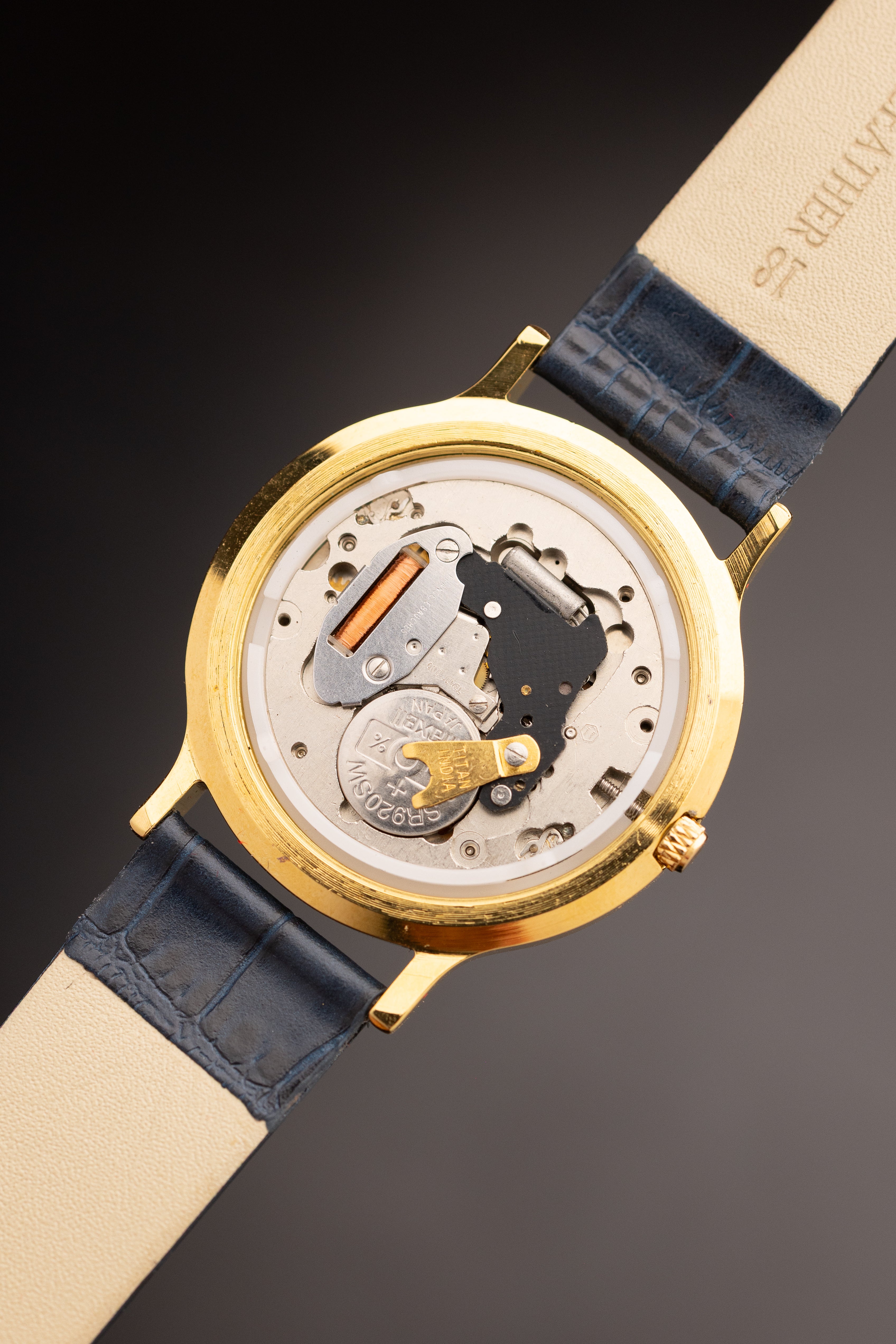 Titan Triple Calendar Moonphase (Ref. 257YAA) (36mm; Quartz)