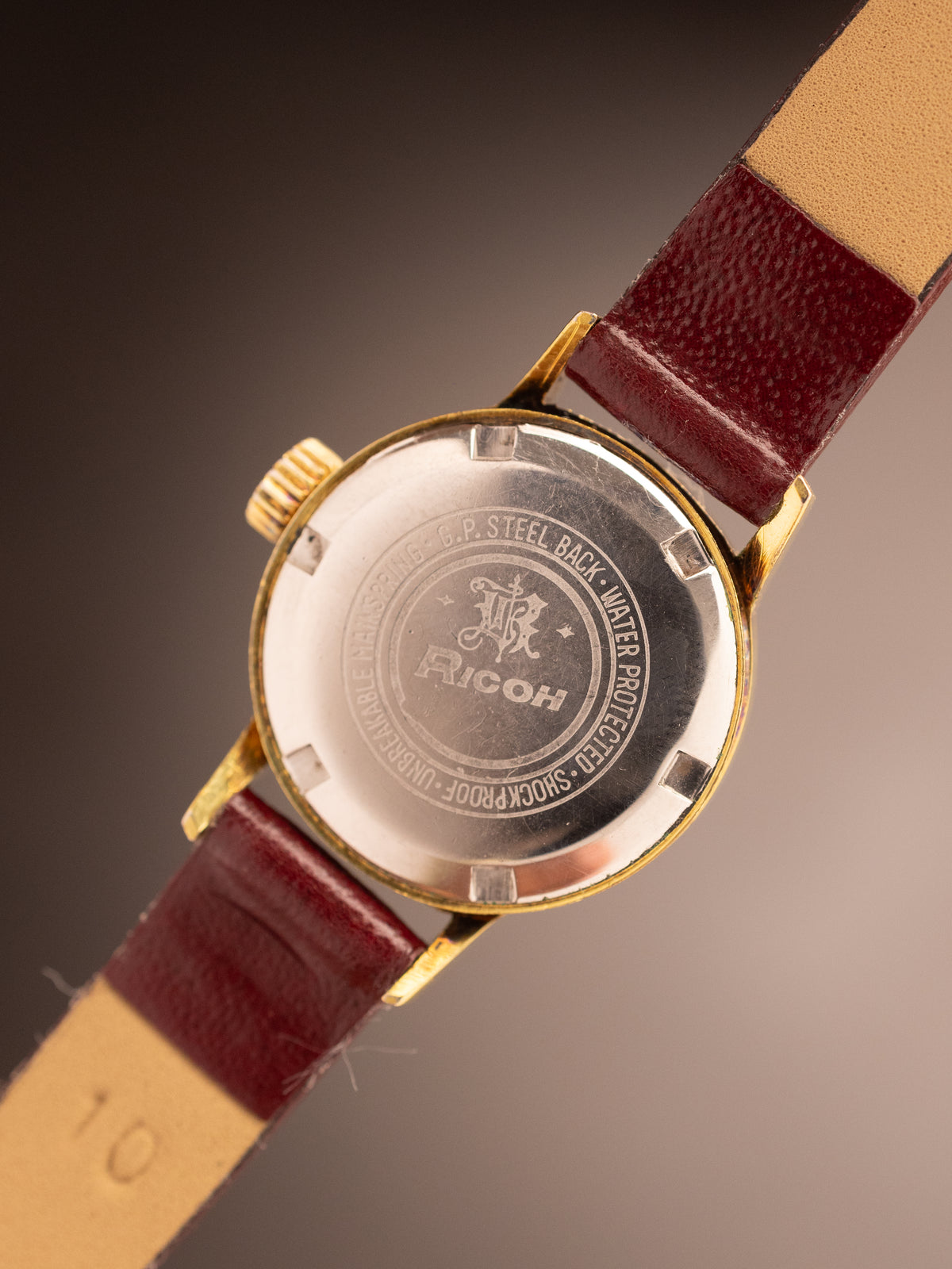 Ricoh India Ladies Gold Patina Dial Brown Strap