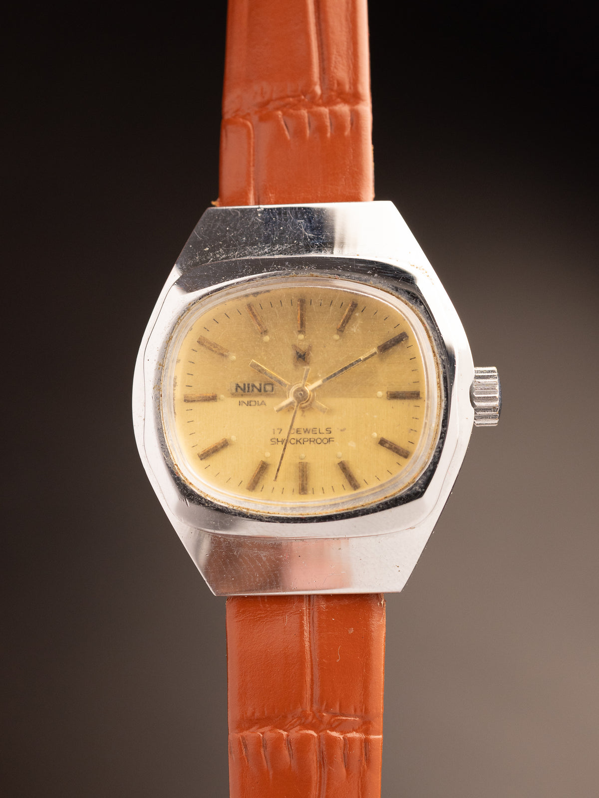 NINO India Ladies Geometric Case Brown Strap ( ref Unknown )