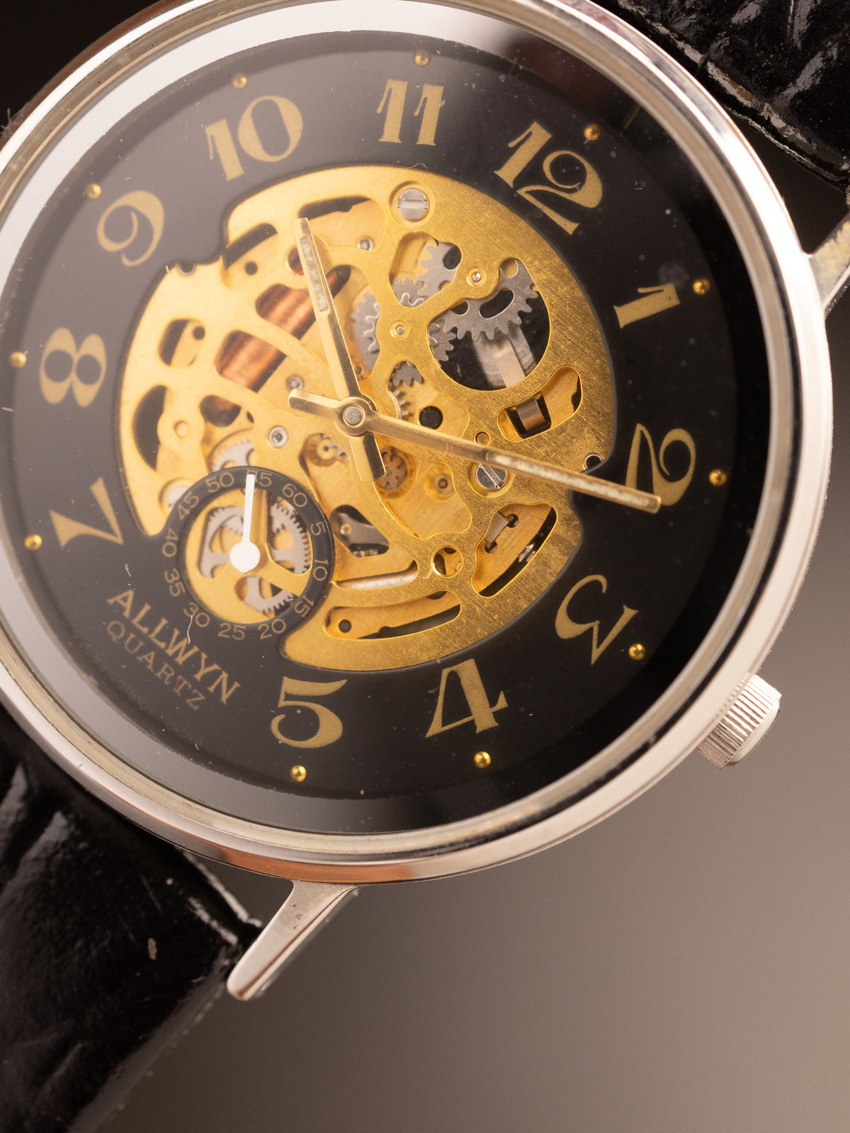 Allwyn Skeleton Quartz Black Gold Dial Arabic Numericals 9N0760 ( V2588-8040 )