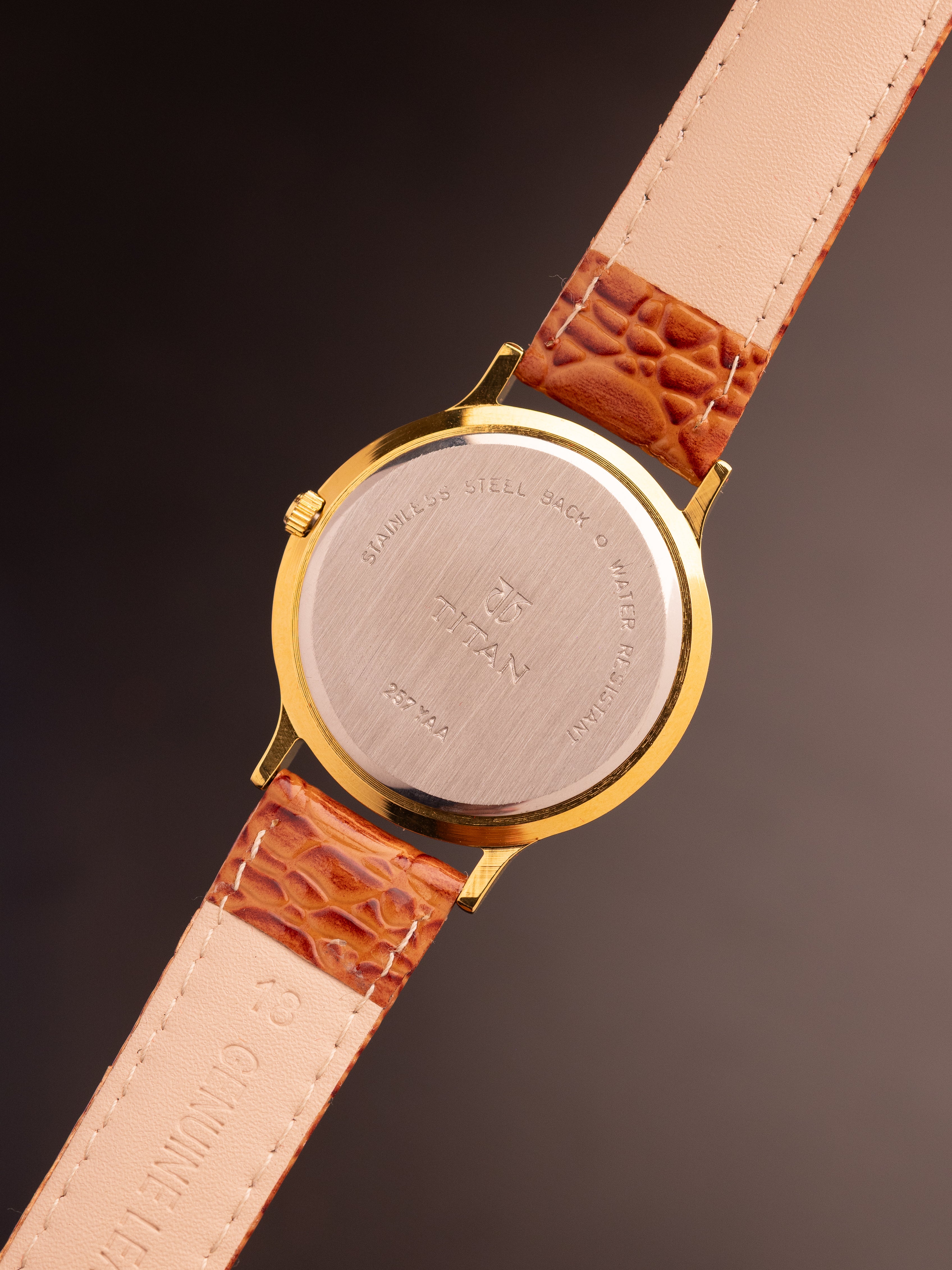 Titan Triple Calendar Moonphase (Ref. 257YAA) (36mm; Quartz)