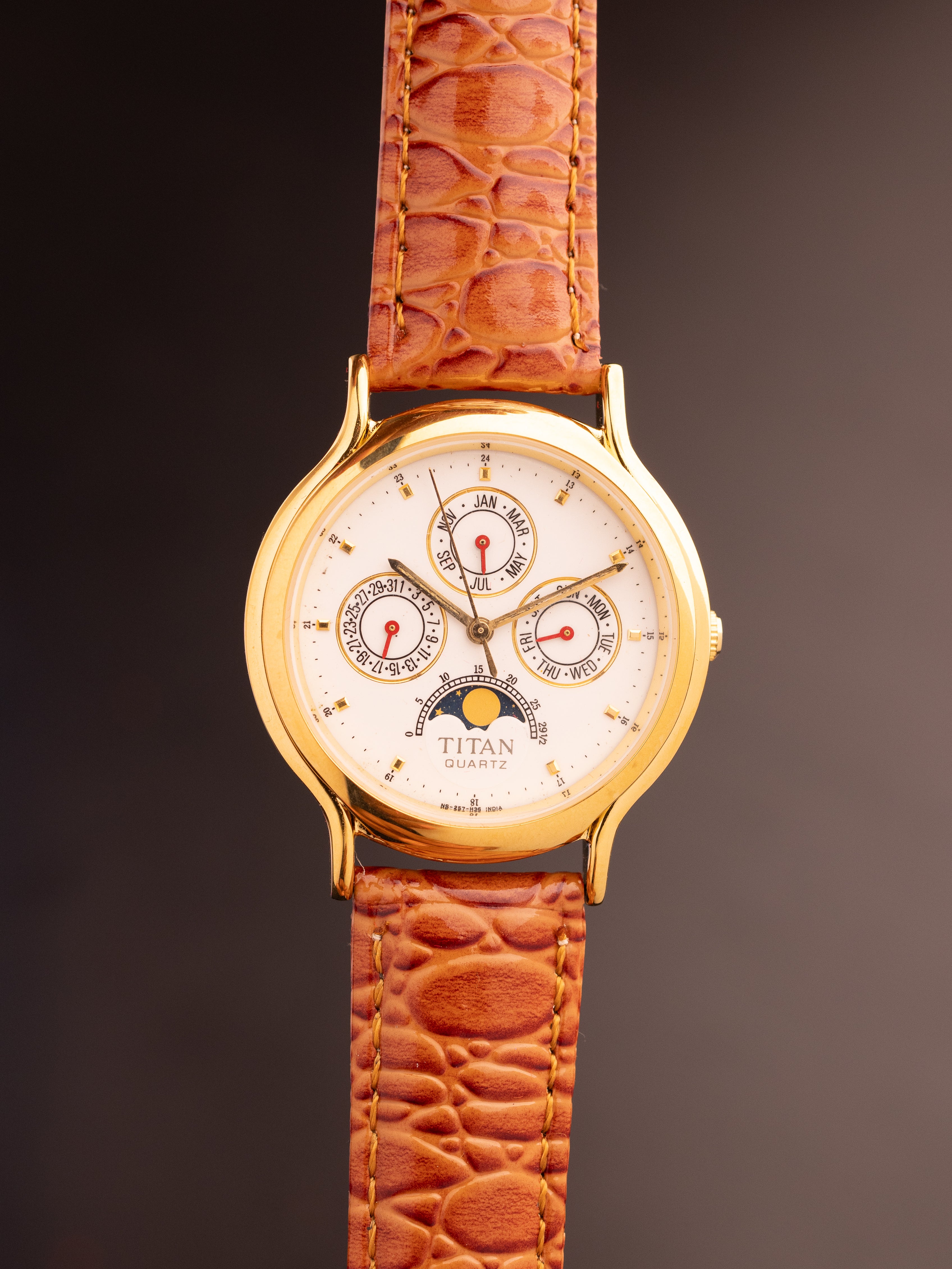 Titan Triple Calendar Moonphase (Ref. 257YAA) (36mm; Quartz)