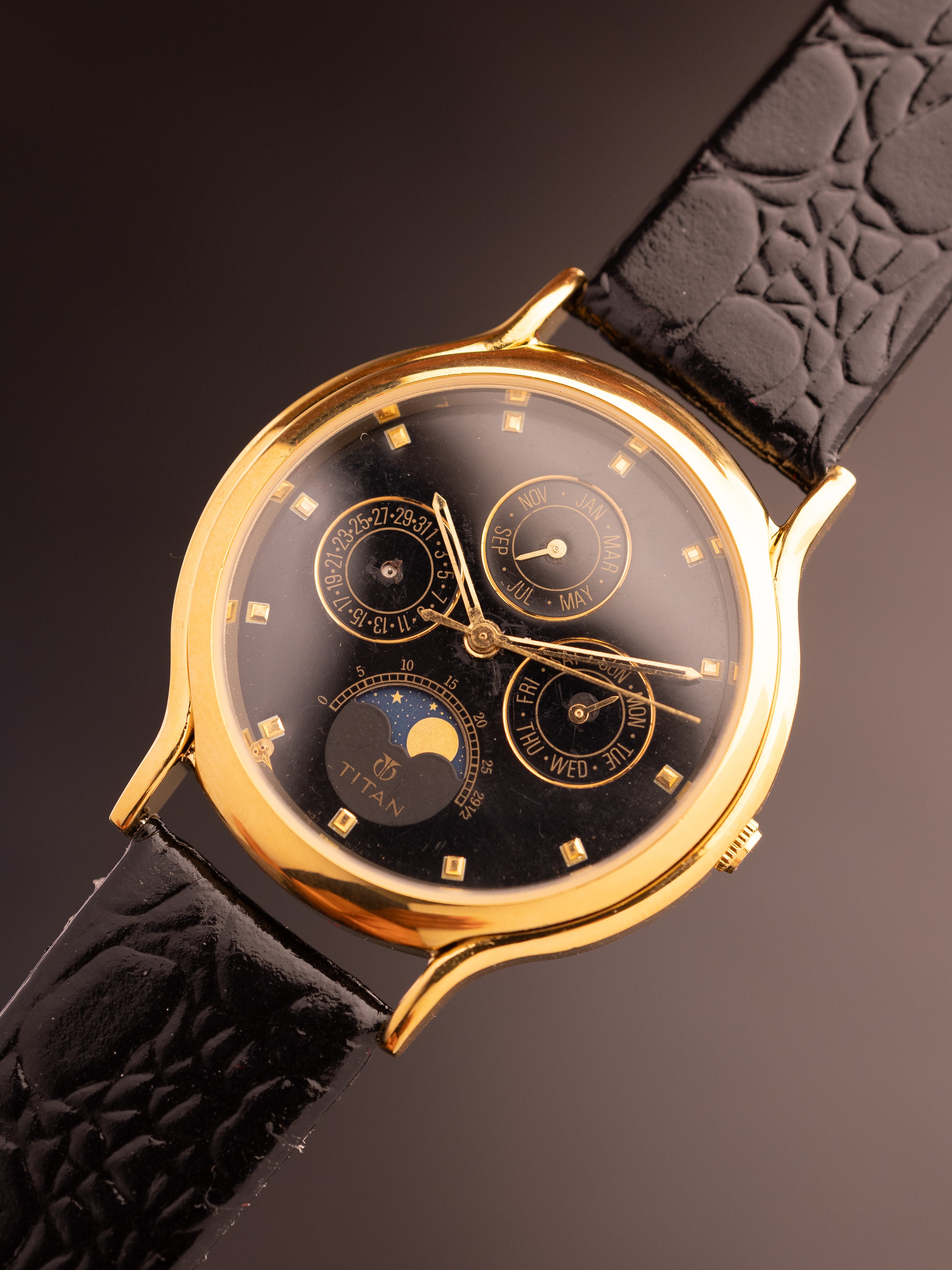 Titan Triple Calendar Moonphase (Ref. 257YAA) (36mm; Quartz)