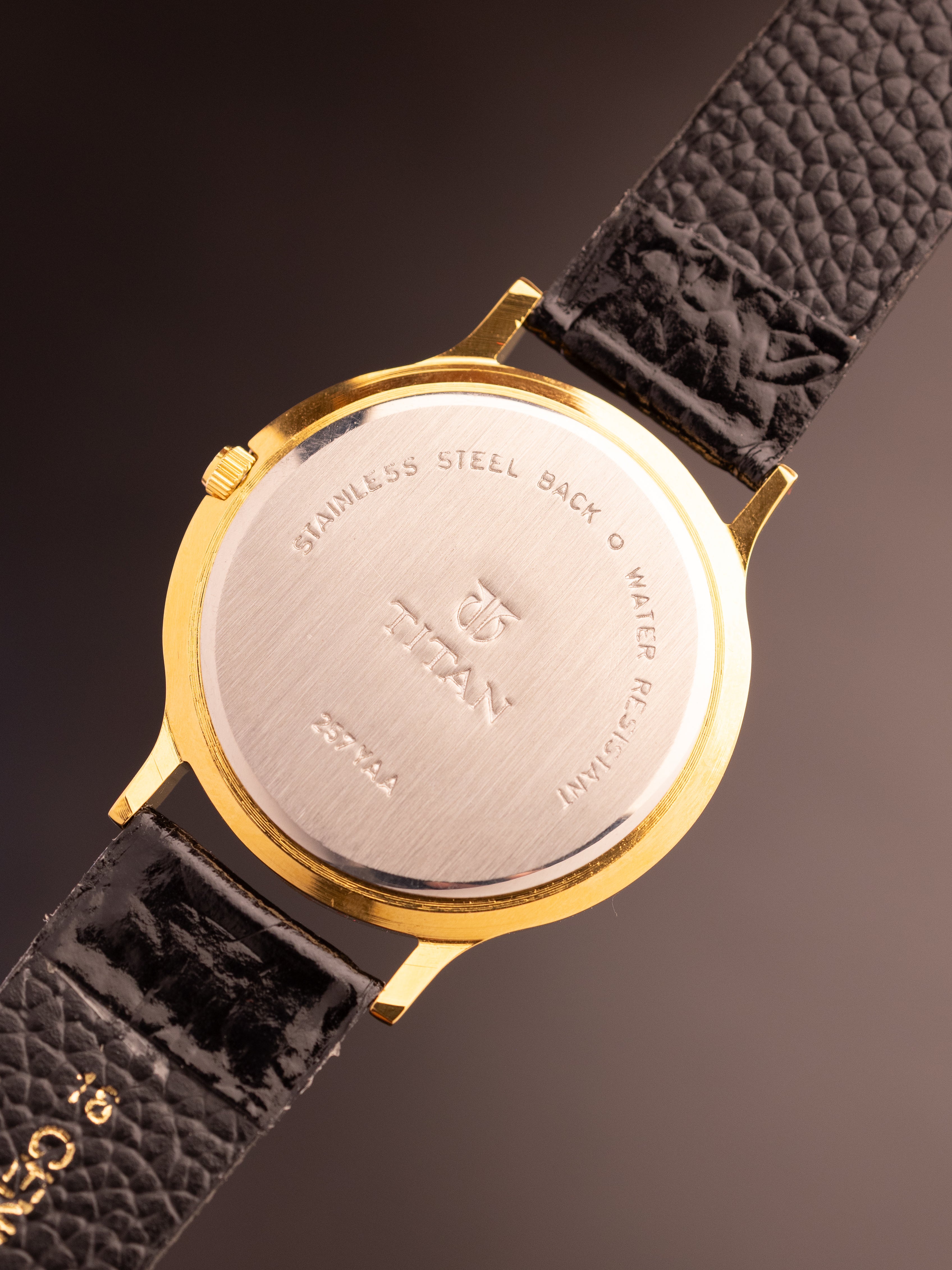 Titan Triple Calendar Moonphase (Ref. 257YAA) (36mm; Quartz)