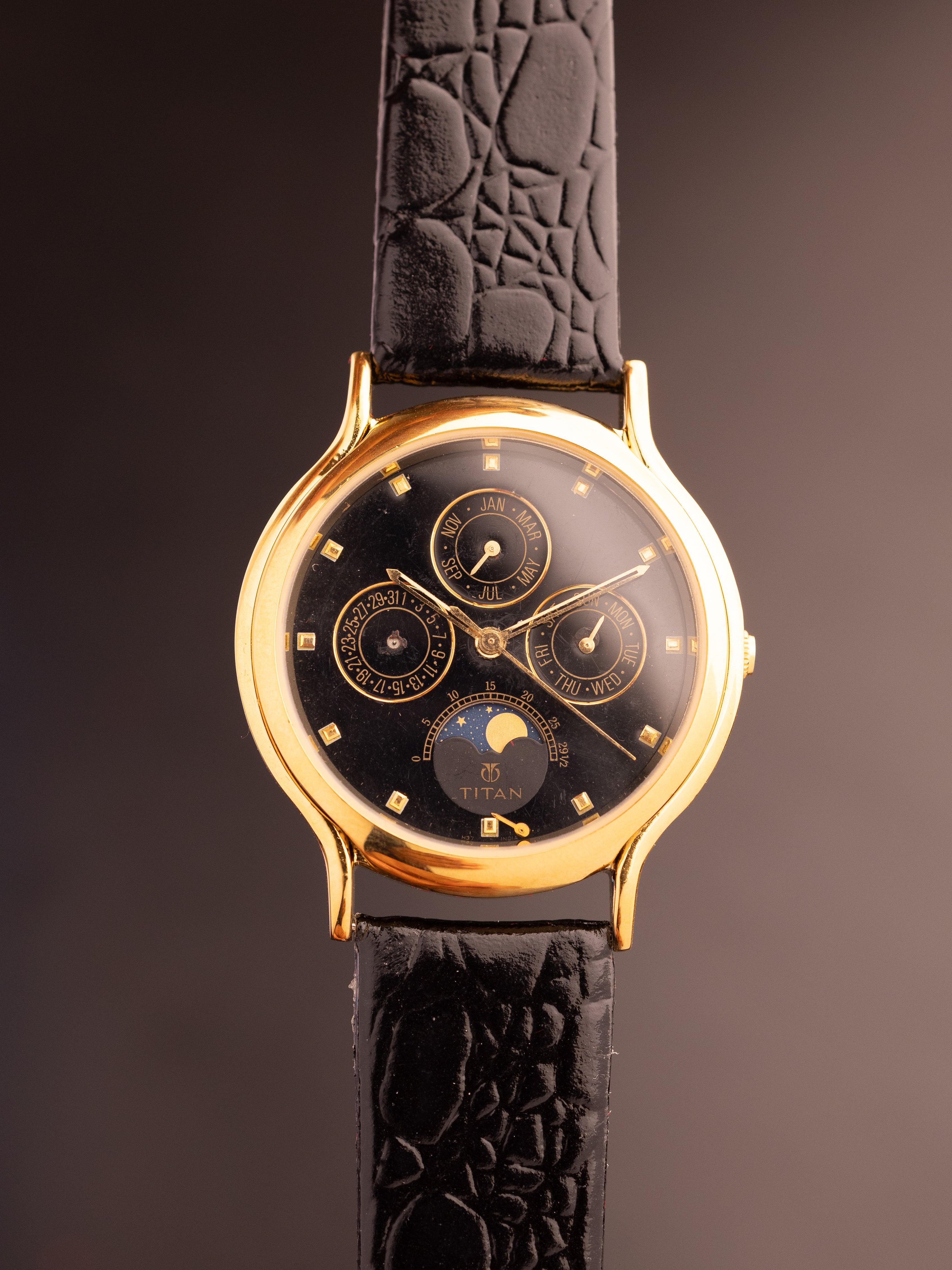 Titan Triple Calendar Moonphase (Ref. 257YAA) (36mm; Quartz)