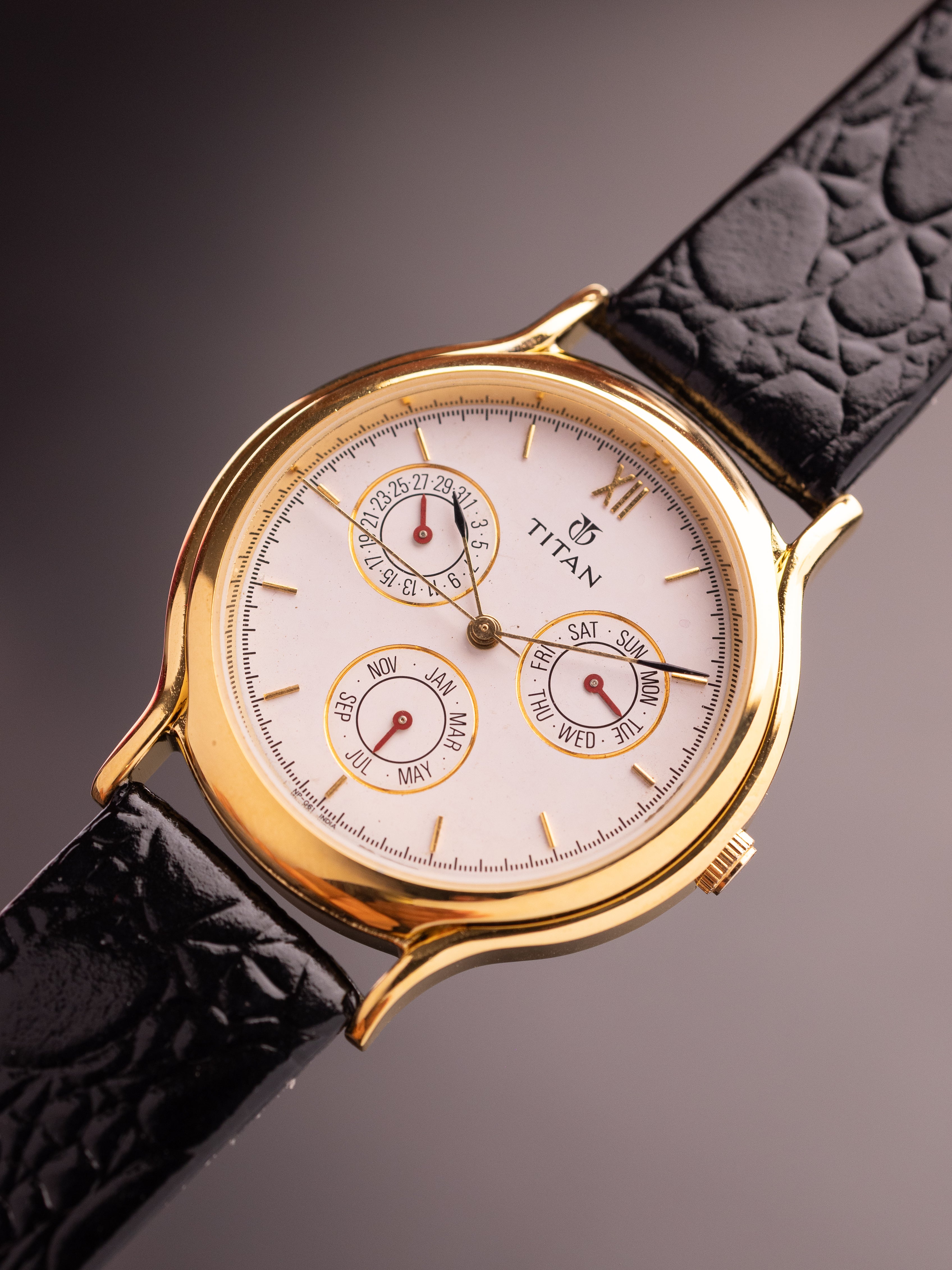 Titan Triple Calendar (Ref. 257YAA) (36mm; Quartz)