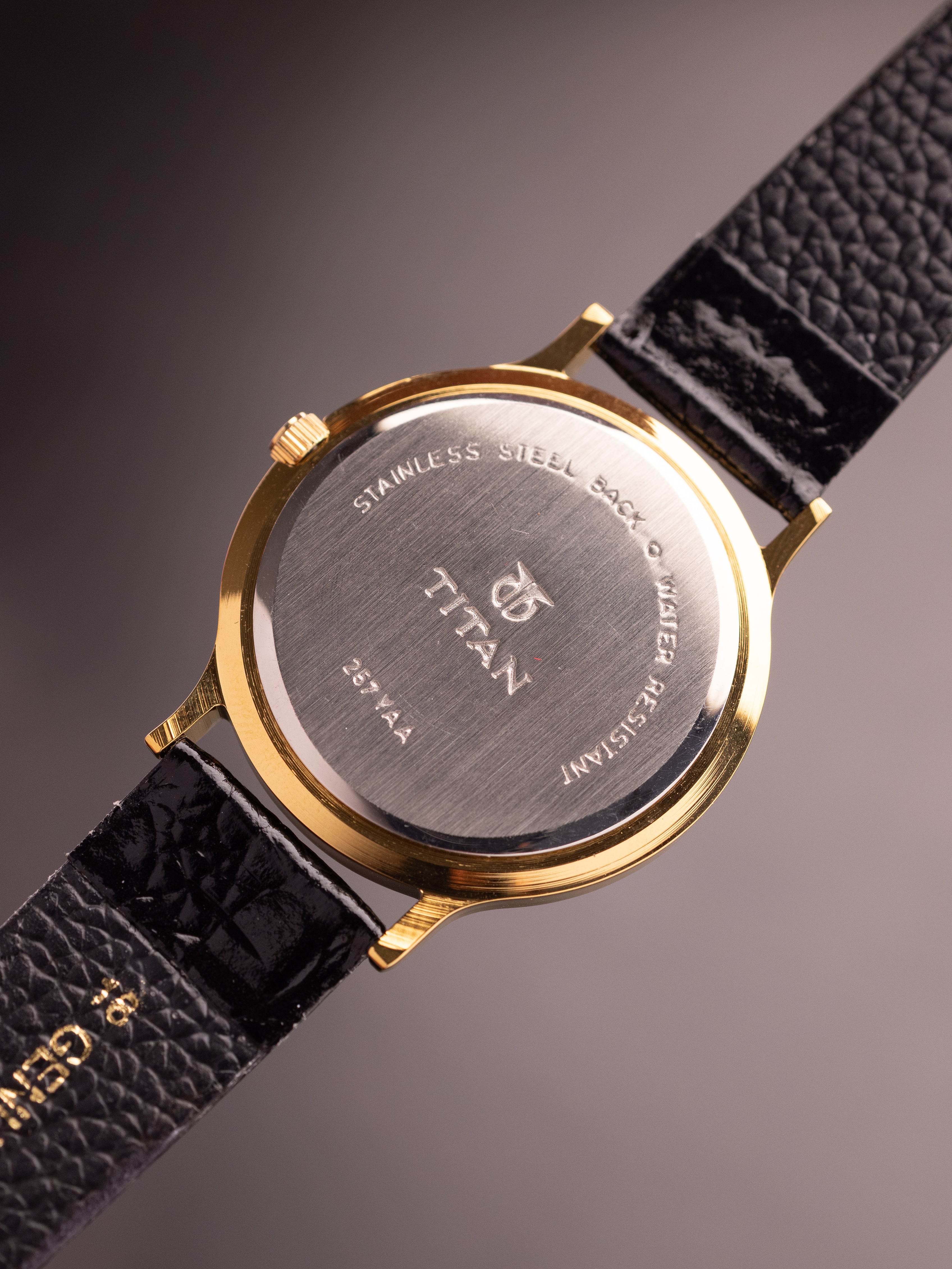 Titan Triple Calendar (Ref. 257YAA) (36mm; Quartz)