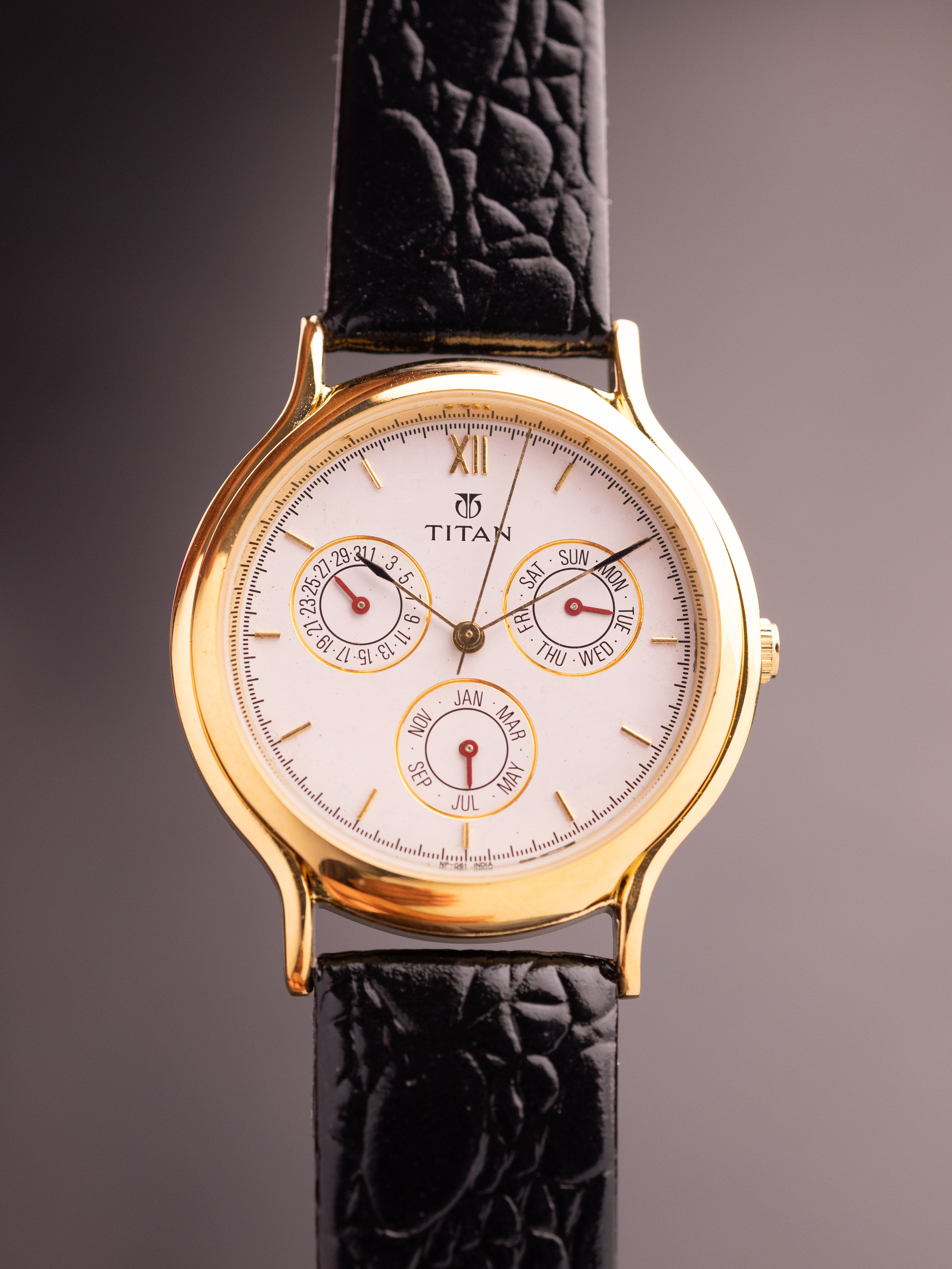 Titan Triple Calendar (Ref. 257YAA) (36mm; Quartz)