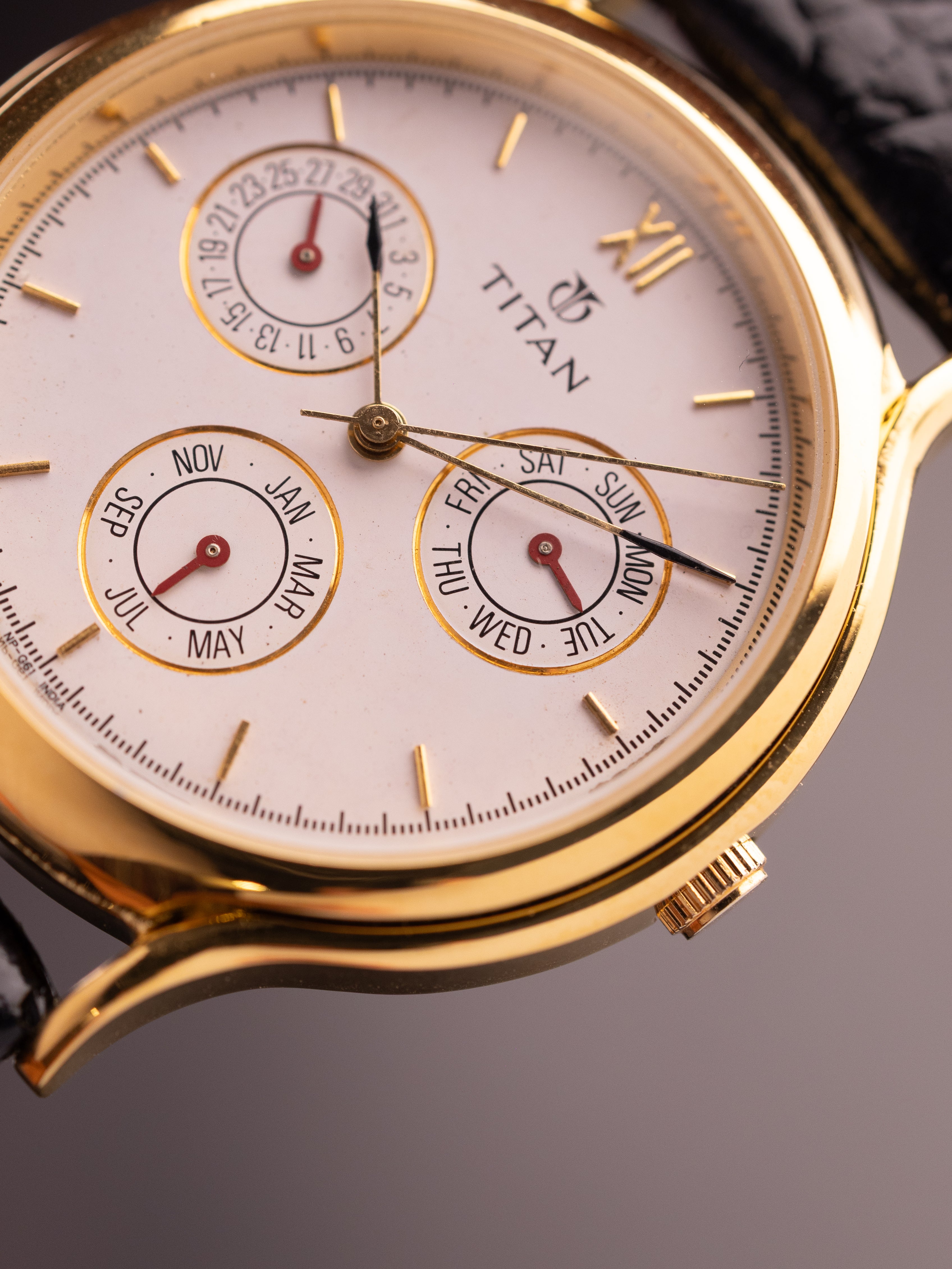 Titan Triple Calendar (Ref. 257YAA) (36mm; Quartz)