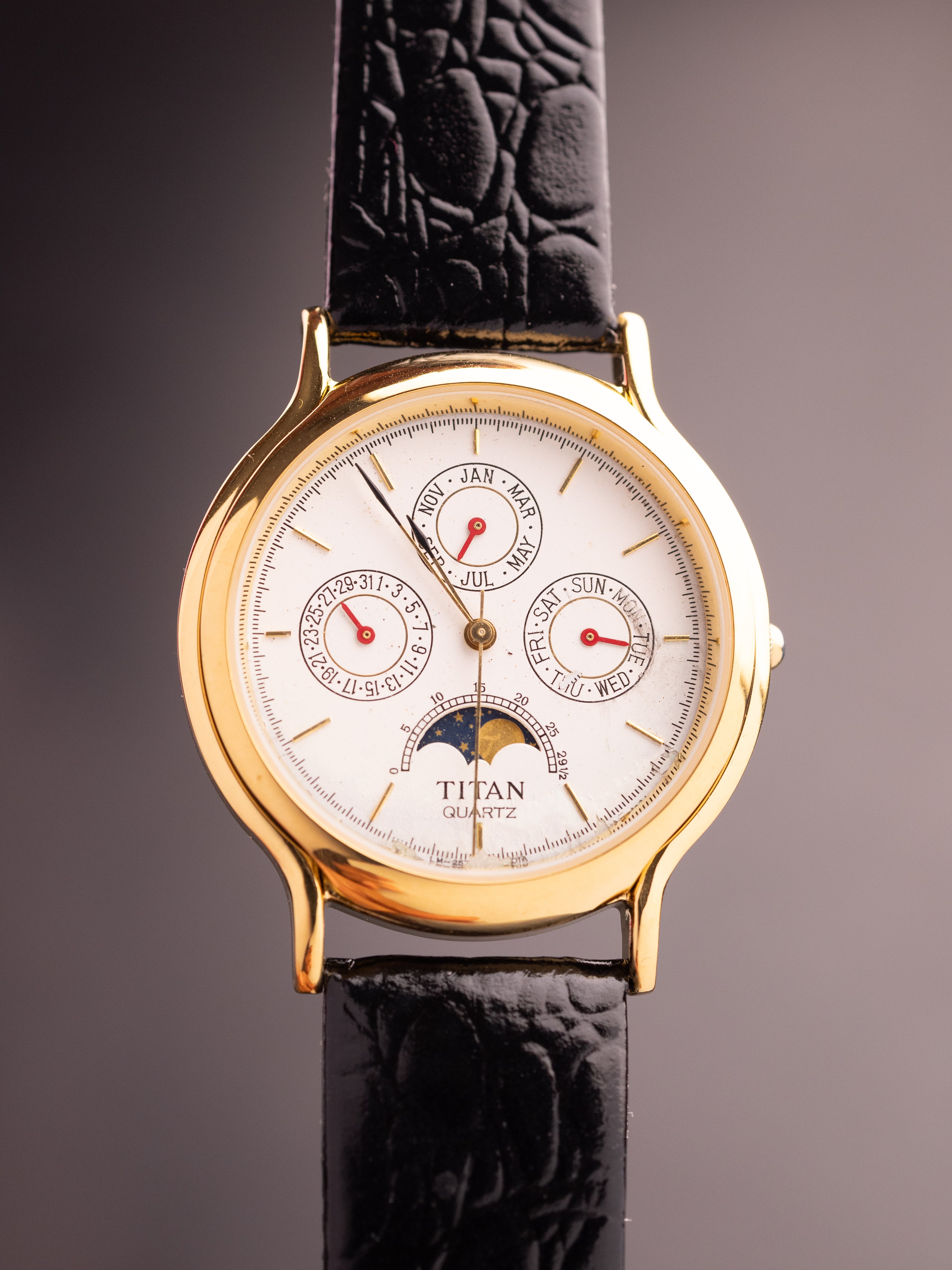 Titan Triple Calendar Moonphase (Ref. 257YAA) (36mm; Quartz)