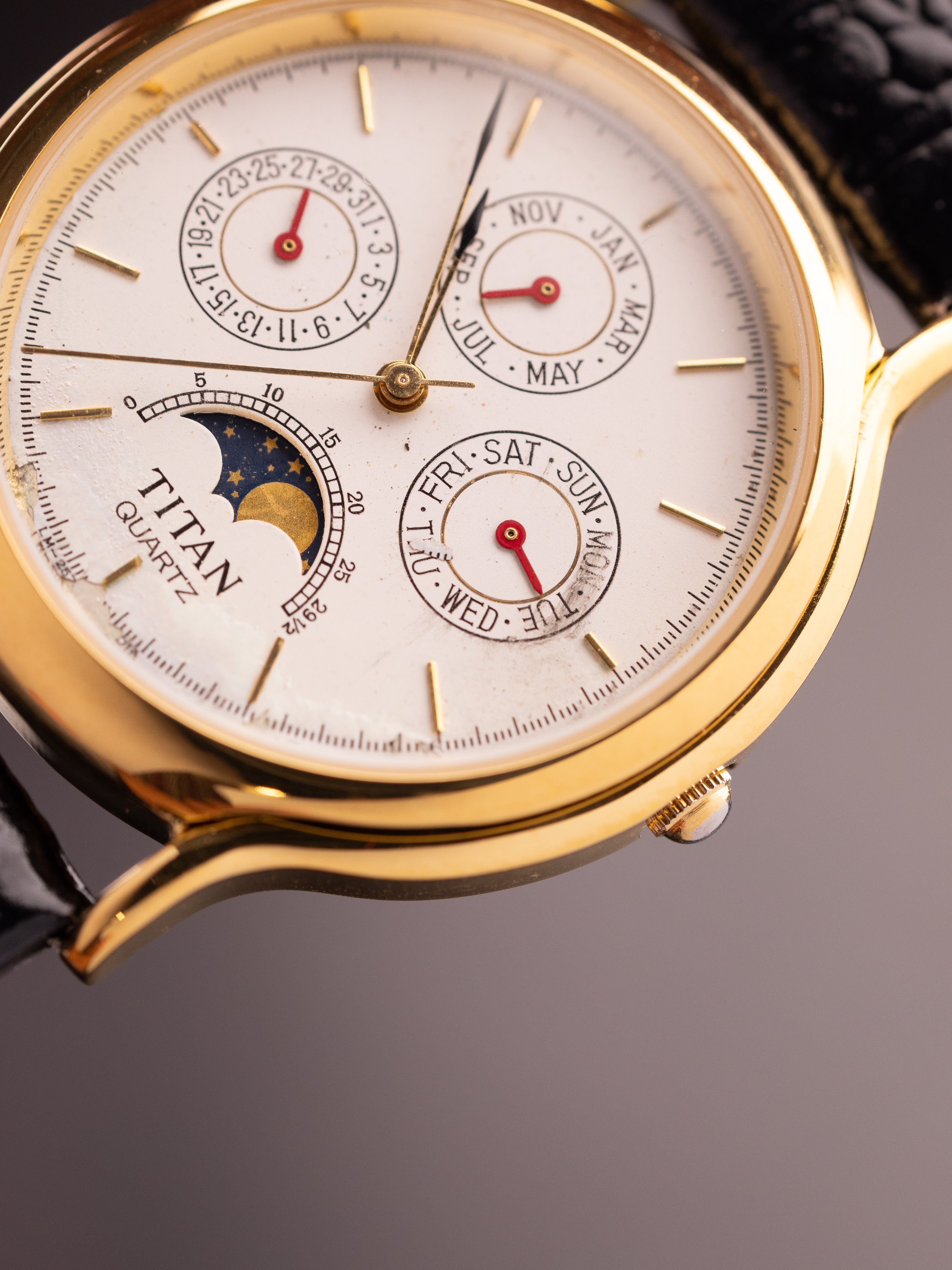 Titan Triple Calendar Moonphase (Ref. 257YAA) (36mm; Quartz)