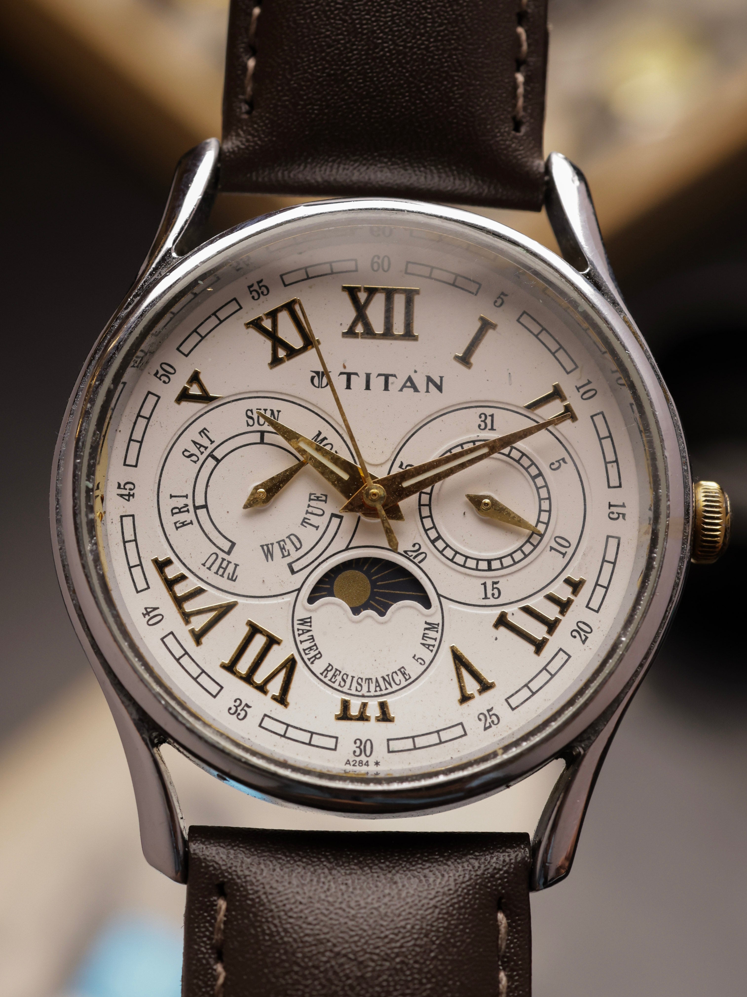 Titan Moonphase (Ref. 1487YAB) – White Dial
