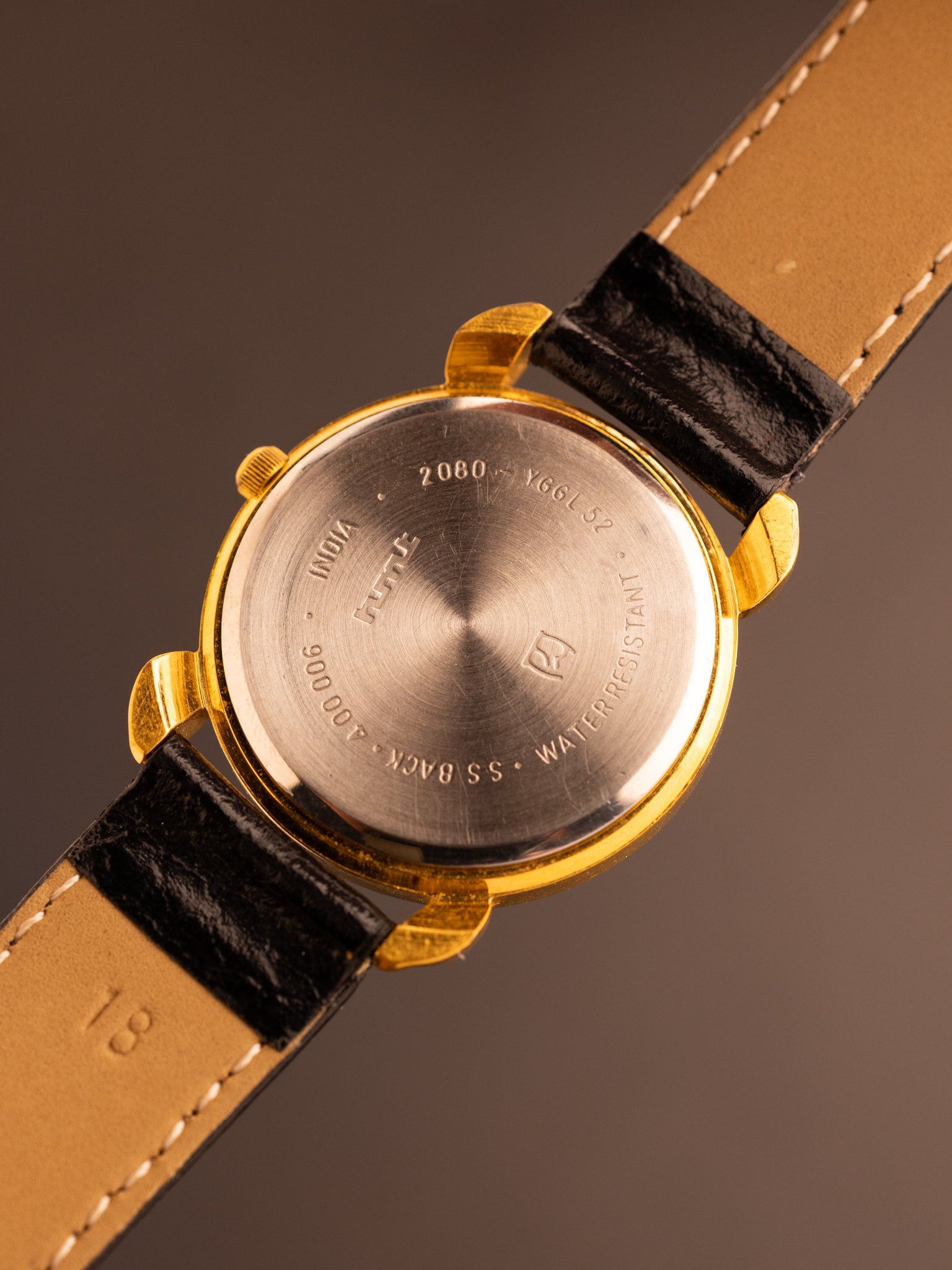 HMT Swarna (Ref. 2080-YGGL52) (33mm; Quartz)