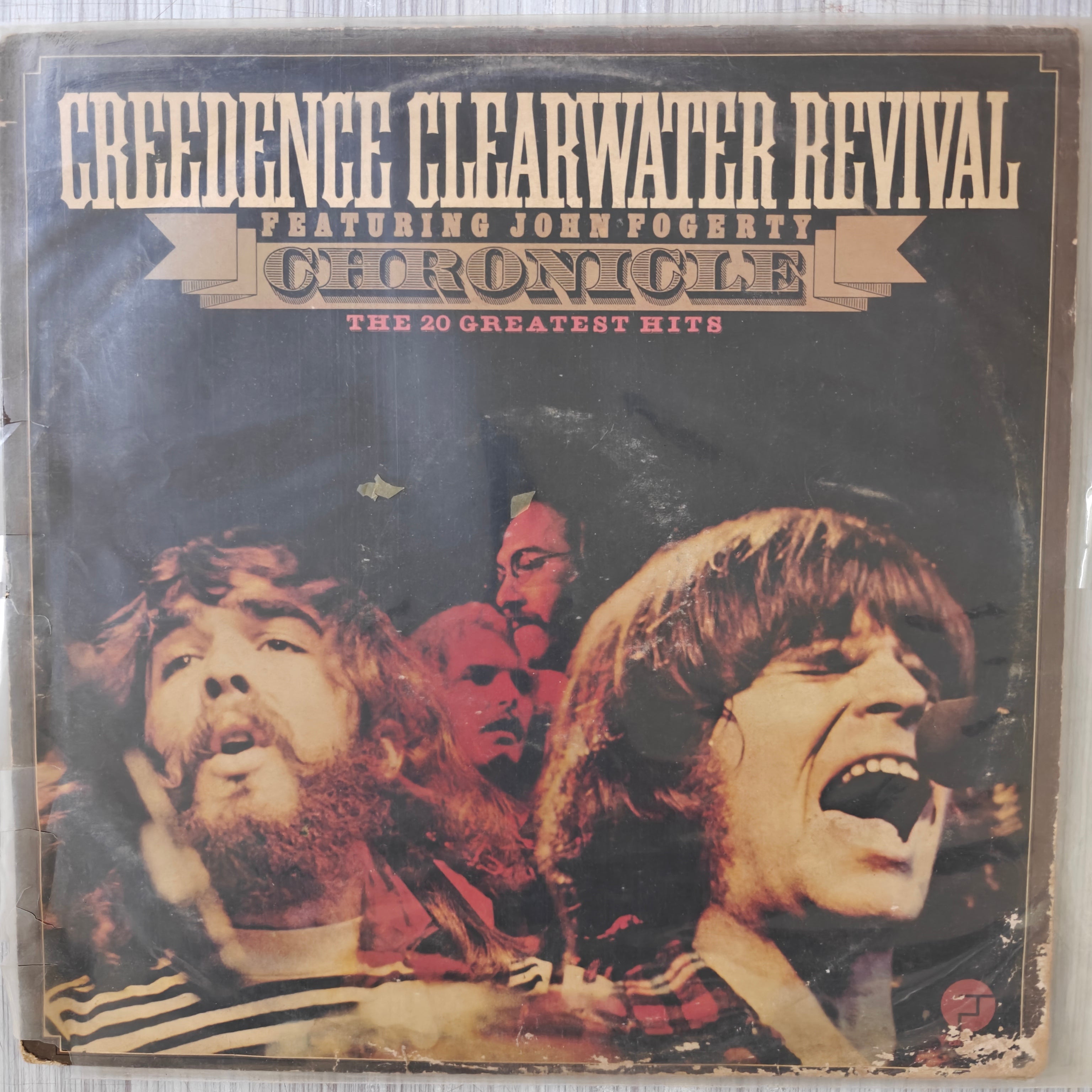 creedence-clearwater-revival-featuring-john-fogerty-chronicle---20-greatest-hits-vinyl-record.jpg